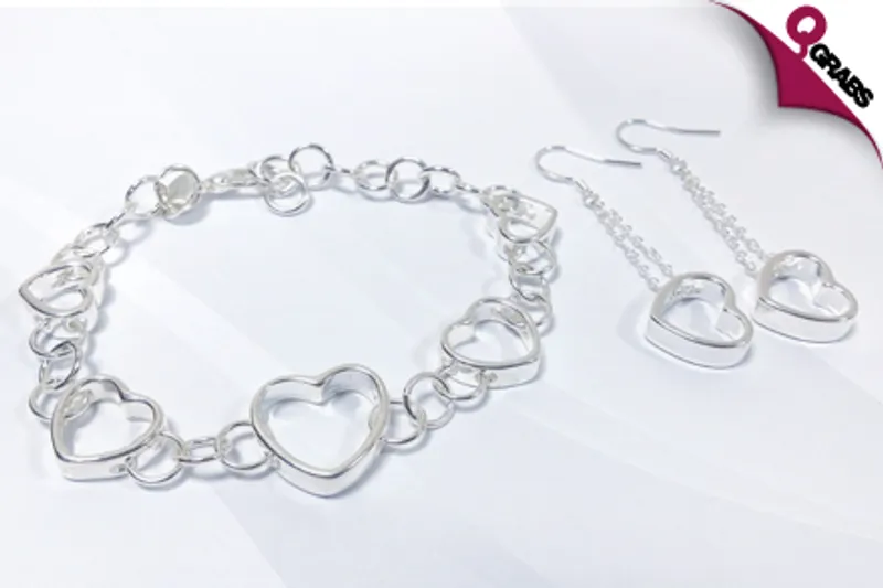 From QR35, Show Your Love with a Heart Jewelry Set - Includes Earrings and a Bracelet in Silver Finish! (Up to QR138 Value)